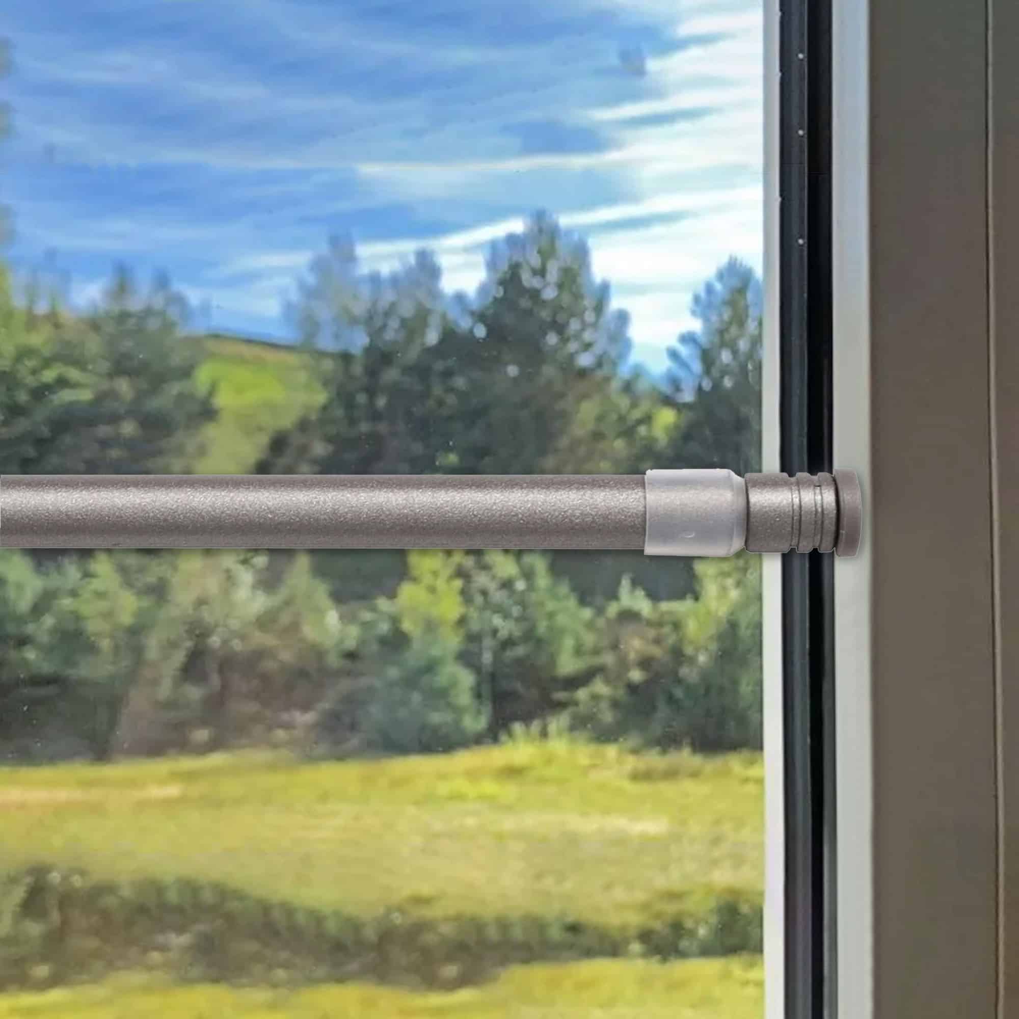 graphite tension rod in situation on window frame