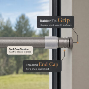 Close-up of the rod end cap showing rubber tip, tool-free tension, and threaded cap against a window frame