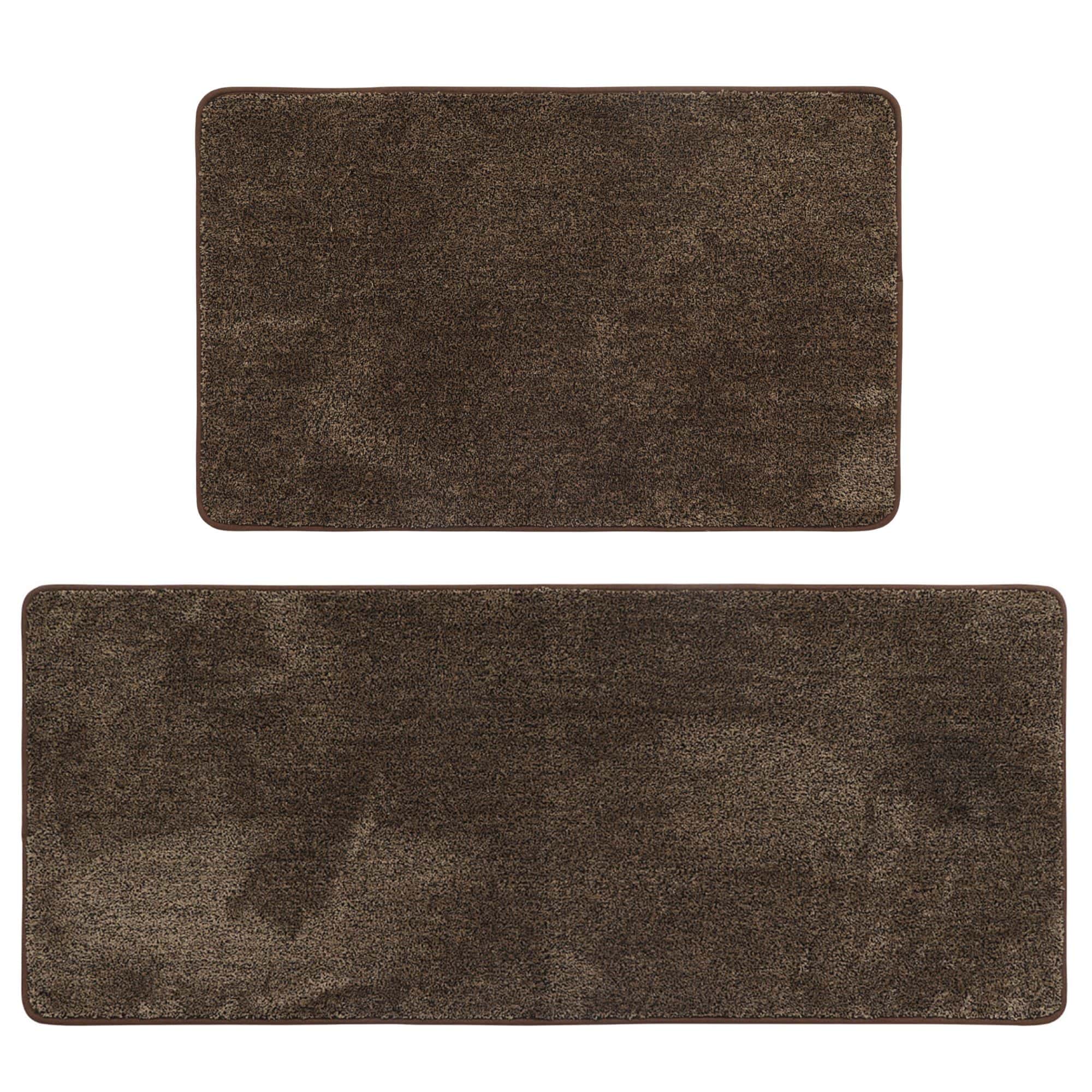 Chocolate brown kitchen mat and runner set lying flat on white background, showing both pieces with soft speckled texture and matching bound edges.