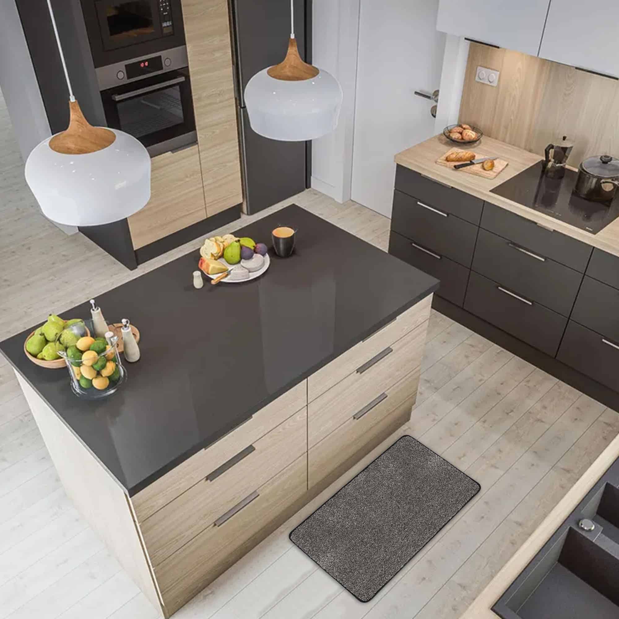 modern kitchen with black mat on the floor