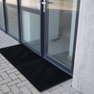 medium rubber mats connected in situation on the floor at front door