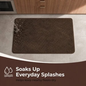 Overhead view of a chocolate brown kitchen mat catching water splashes near a counter, showing how it soaks up everyday spills and keeps floors dry.