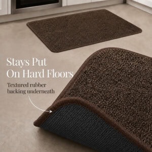 Chocolate brown kitchen mat and runner with a corner lifted to reveal the textured rubber backing that stays put on hard floors.
