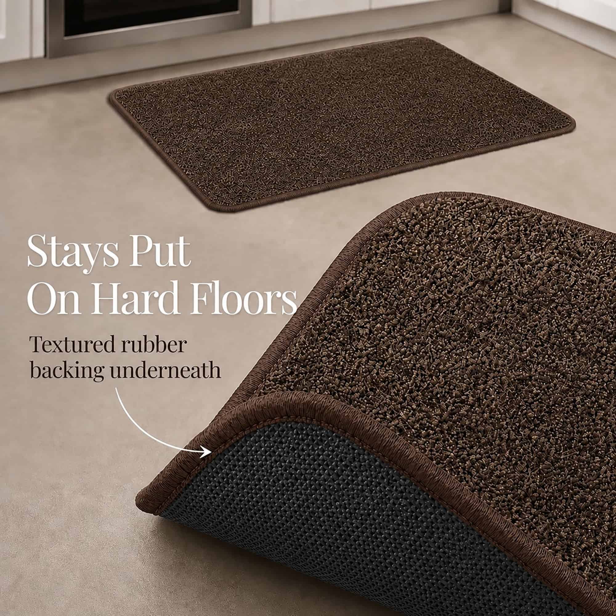 Chocolate brown kitchen mat and runner with a corner lifted to reveal the textured rubber backing that stays put on hard floors.