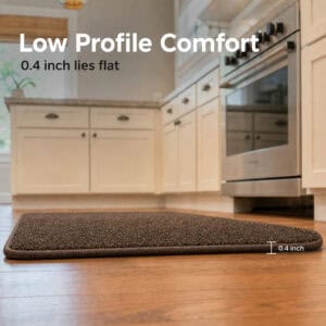 Side view of a thin low profile chocolate brown kitchen mat lying flat on the floor, measuring 0.4 inch for an easy, trip-free fit.