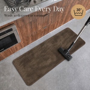 Chocolate brown kitchen runner beside a vacuum, illustrating easy care with machine wash at 30 degrees or vacuum cleaning.