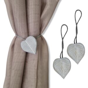 gray heart tiebacks on white background and on curtain