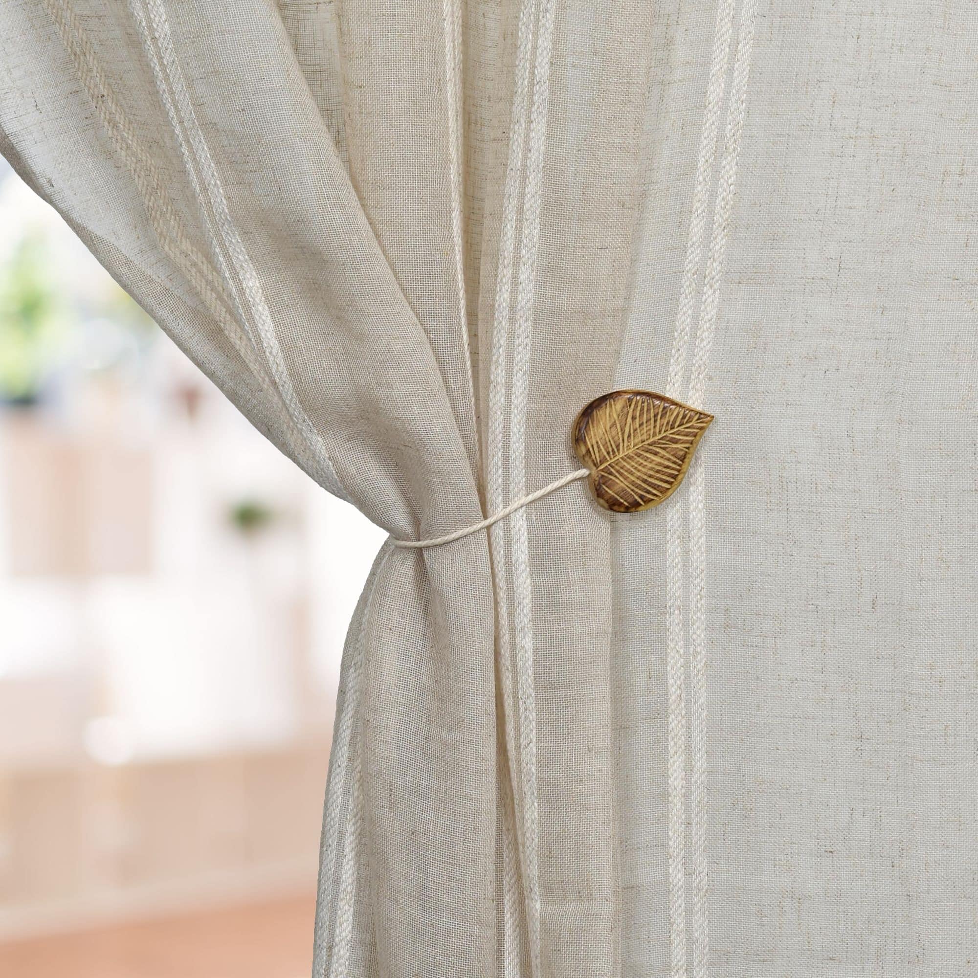 heart curtain holdback on beige curtain