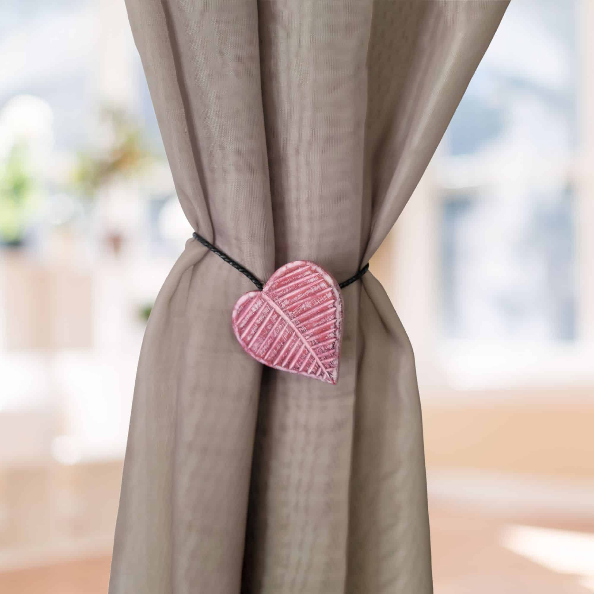 heart curtain holdback on beige curtain