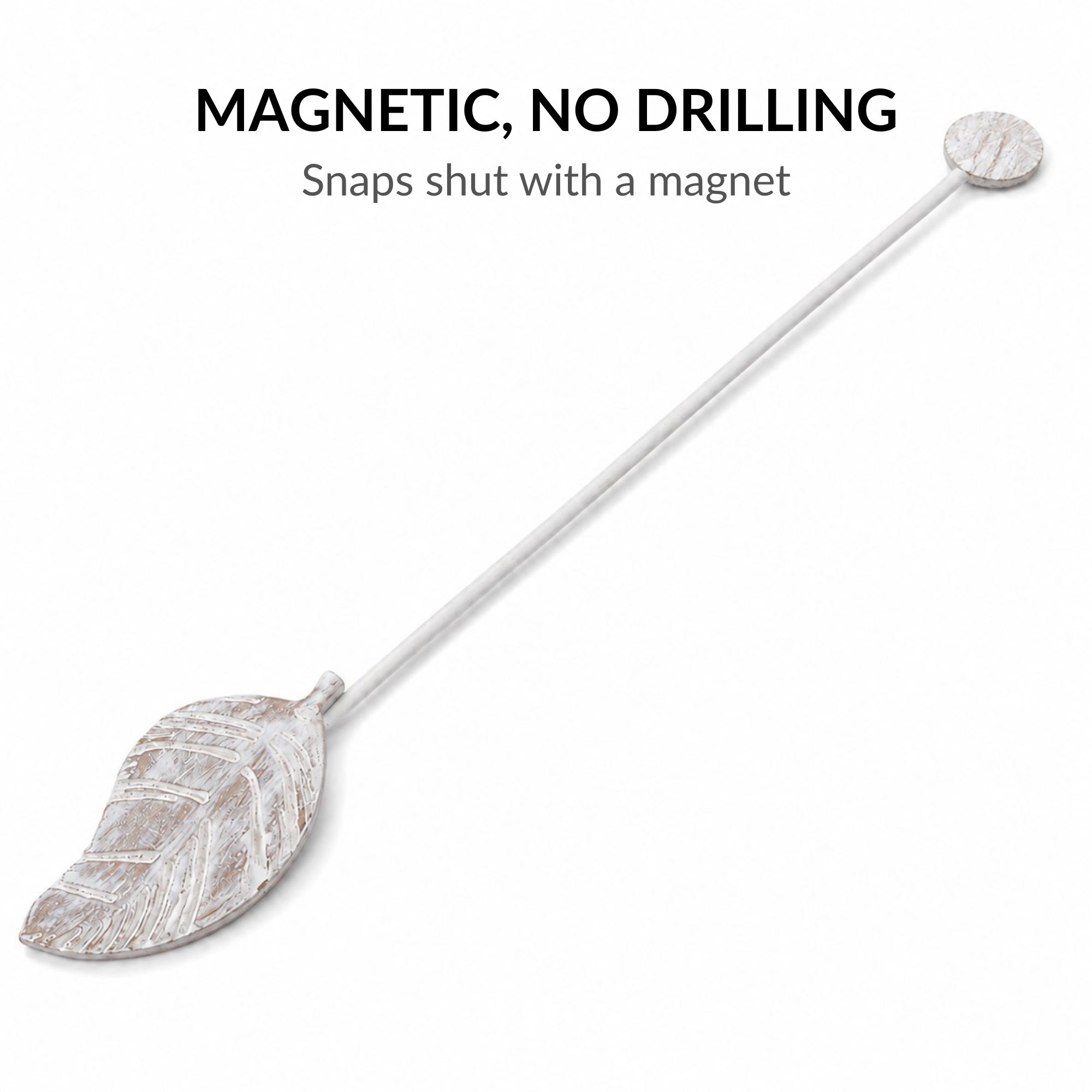 White leaf curtain tieback laid flat showing magnetic end-cap, no drilling required