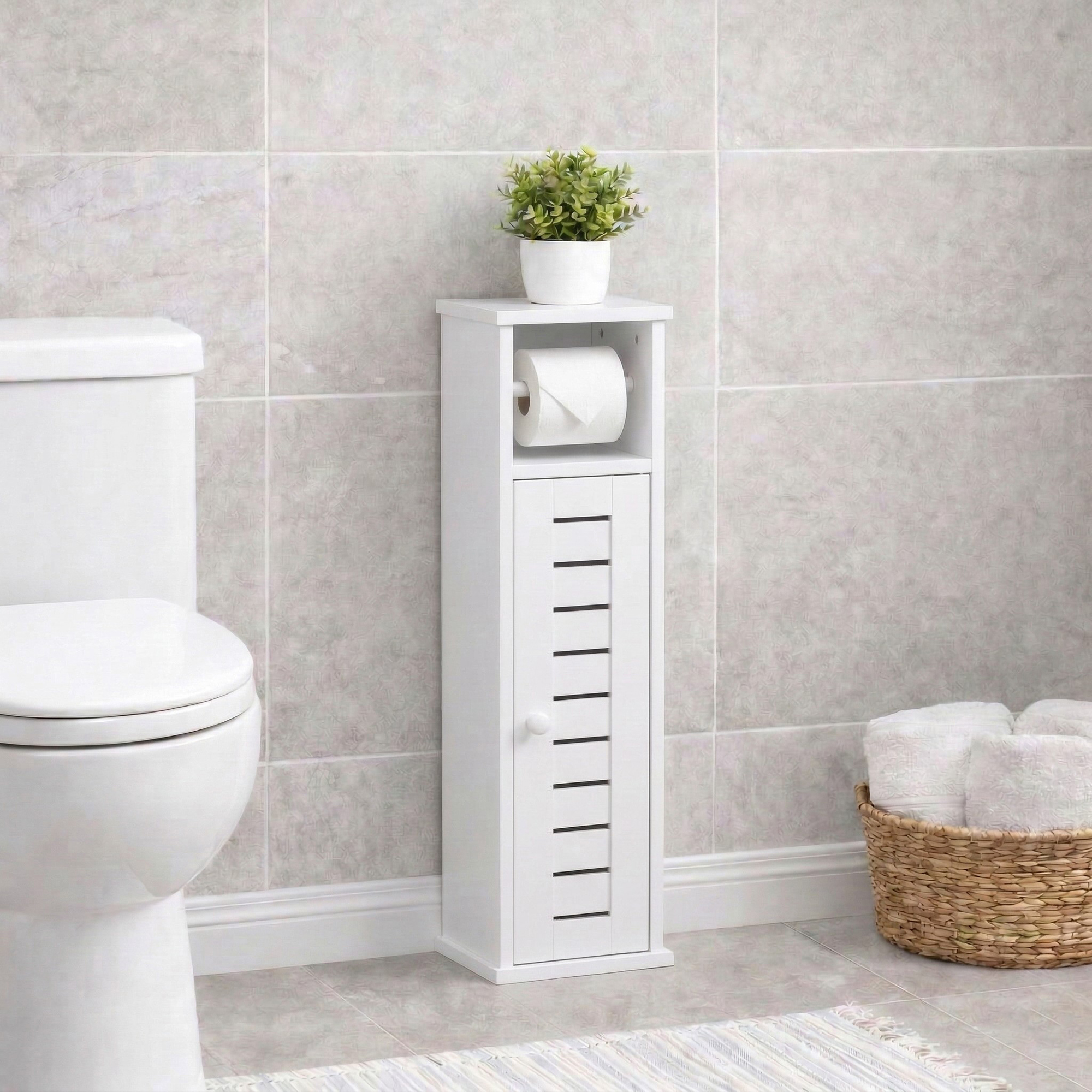 "White toilet paper cabinet with roll holder and louvered door, styled beside a toilet with a plant on top"