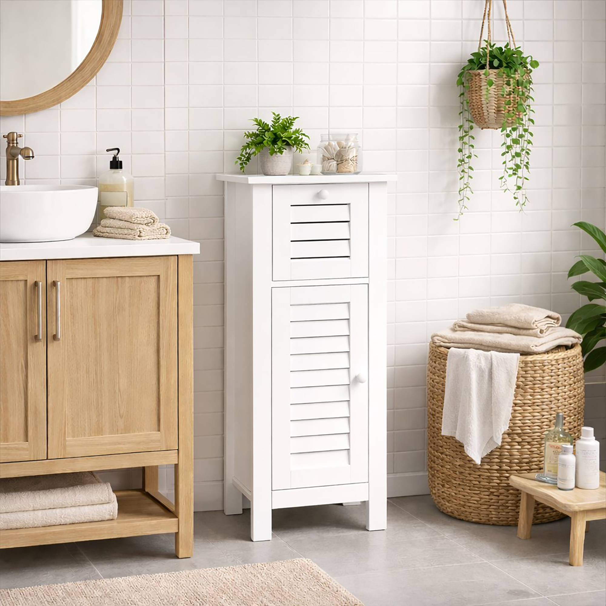 "White louvered bathroom cabinet styled with plants and toiletries in a bright Scandi-style bathroom with oak vanity"