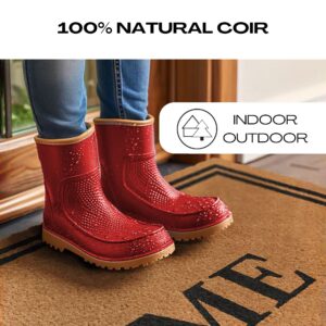 Natural Coir Welcome Home Doormat - Indoor/Outdoor Use: A red rain boot stepping on the coir doormat, showcasing its versatility for indoor and outdoor use.