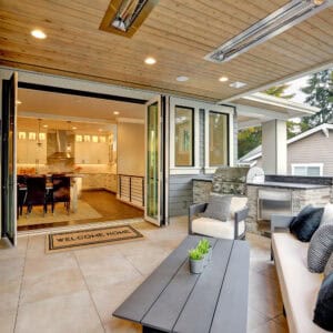 Stylish Outdoor Patio with Welcome Home Doormat: A luxurious patio with a visible "Welcome Home" doormat placed near the entrance of a modern home.