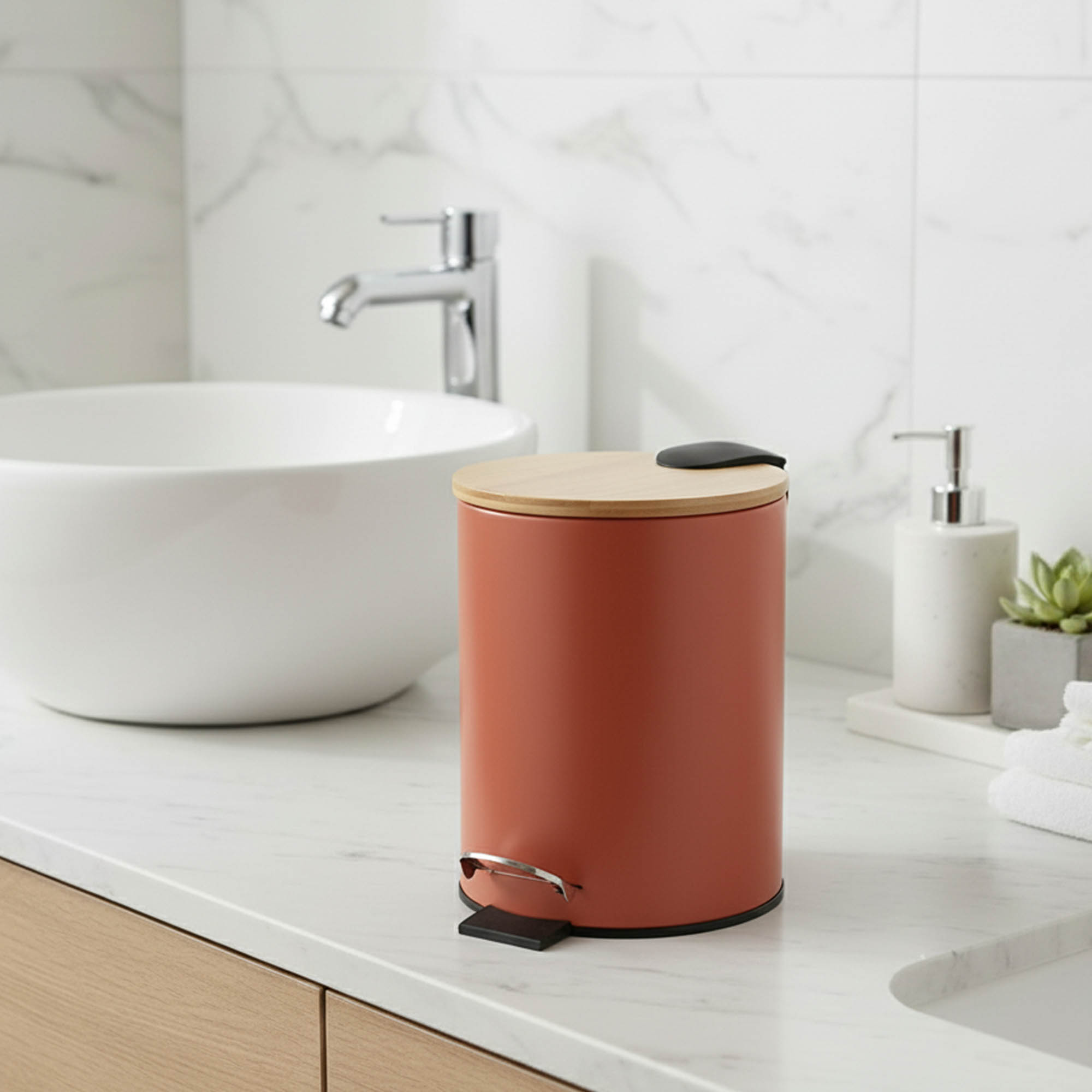 Terracotta step trash can with bamboo lid on bathroom countertop