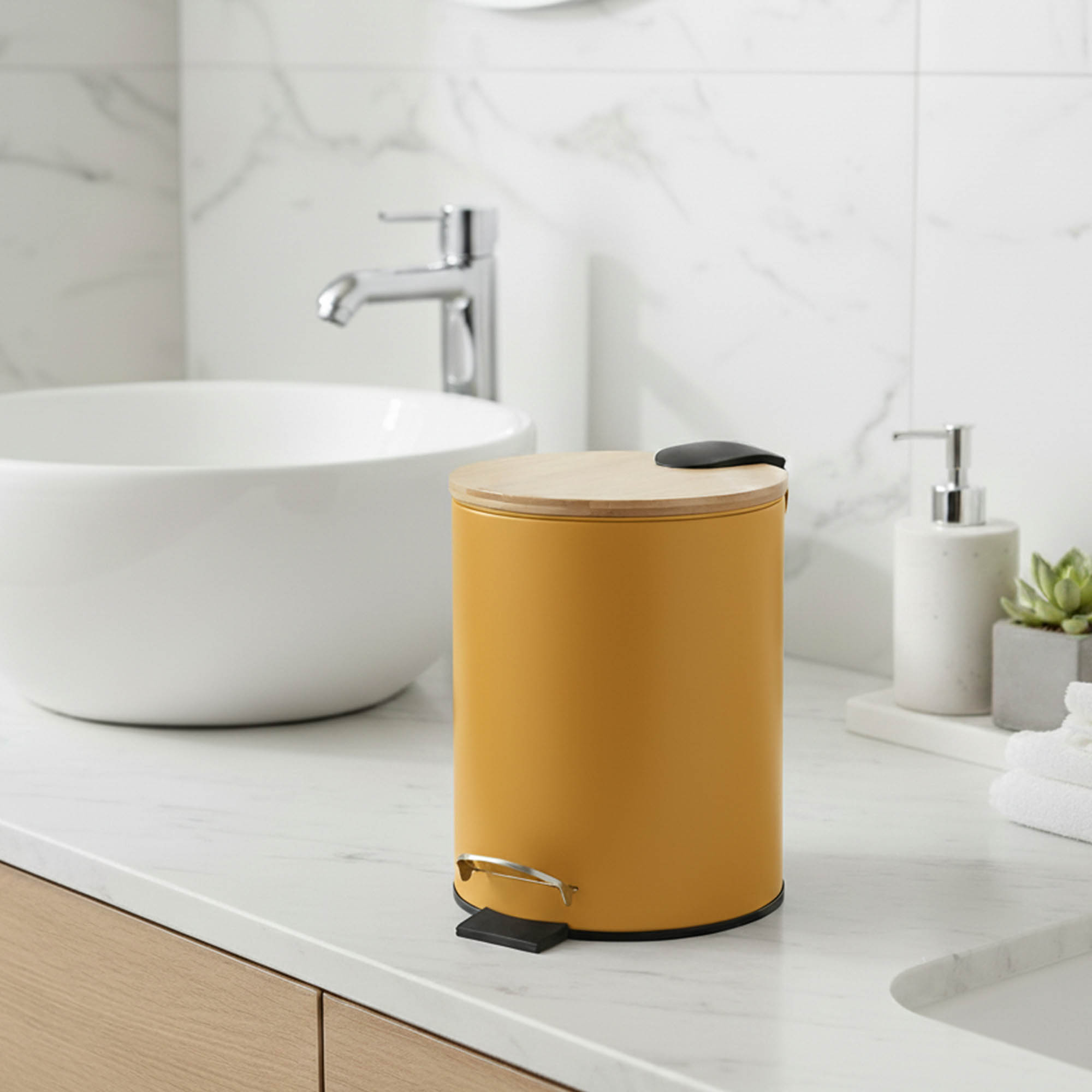 Yellow step trash can with bamboo lid on bathroom countertop