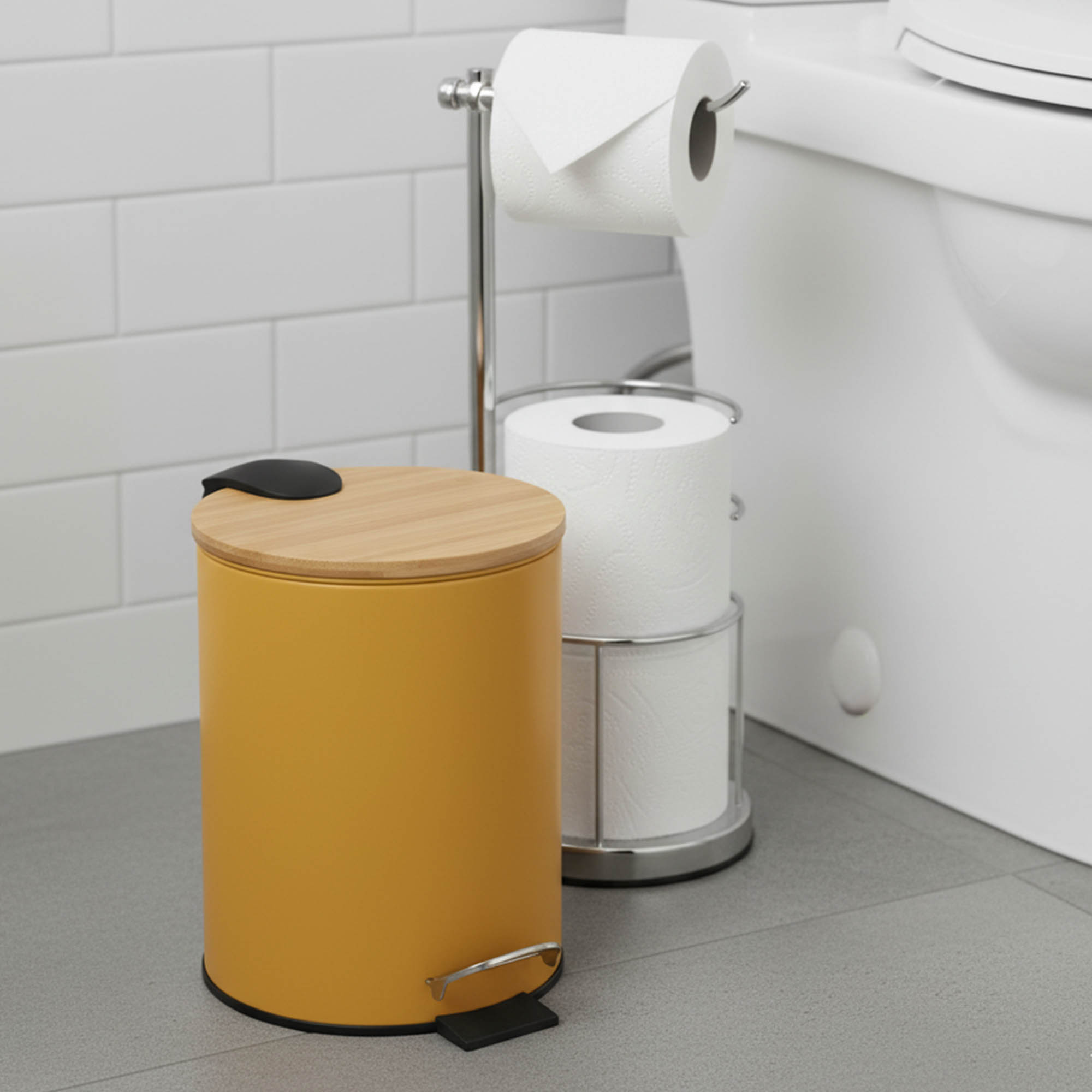 Yellow step trash can with bamboo lid next to toilet