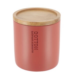 Minimalist red cotton jar featuring a smooth bamboo lid, ideal for storing cotton pads or small bathroom essentials.