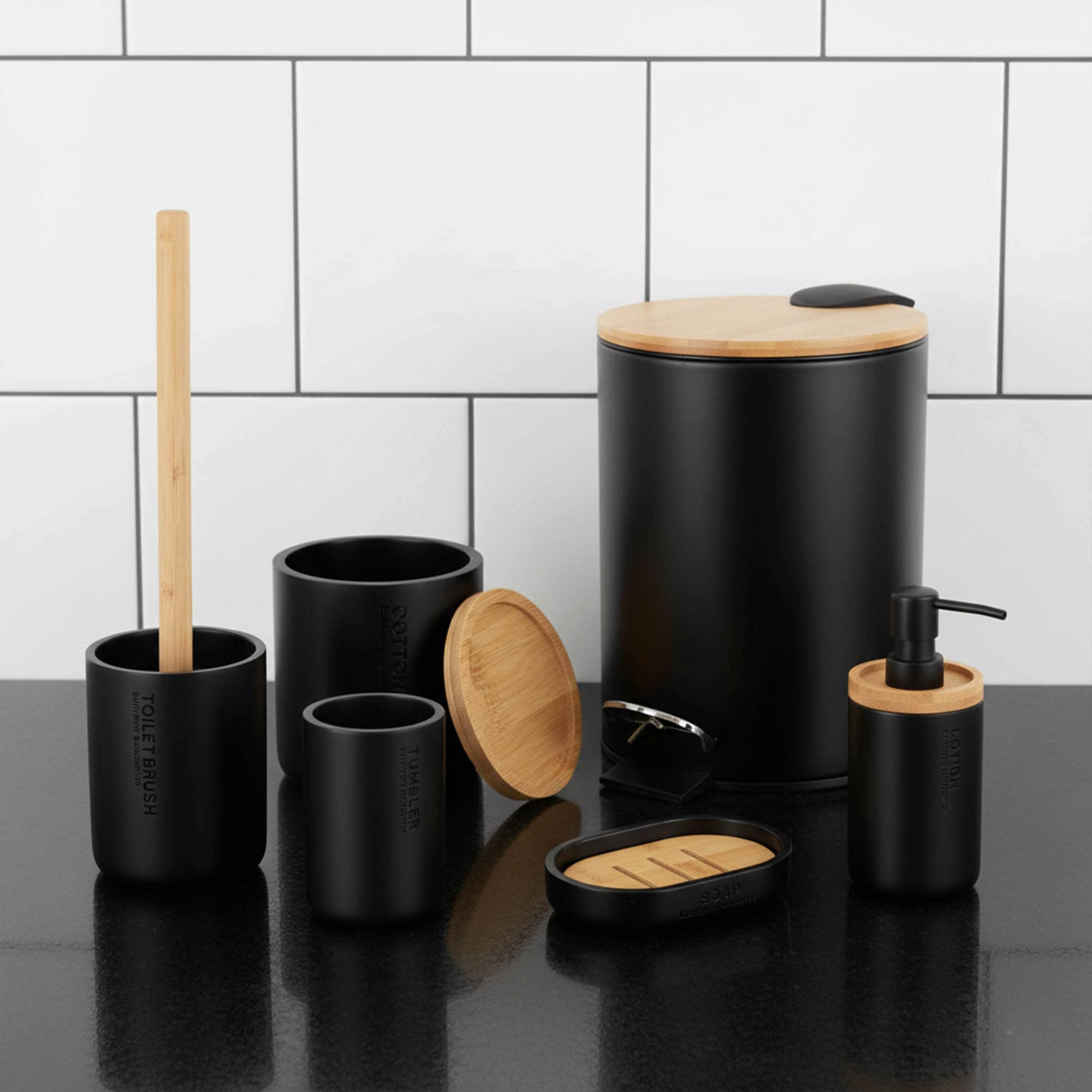 Black 6-piece bathroom accessory set with bamboo lids and accents displayed on a marble countertop
