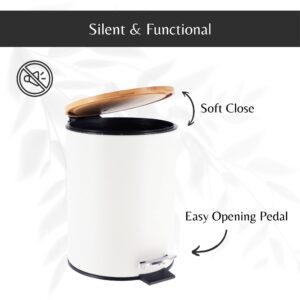 Open white trash can showing the soft-close bamboo lid and the easy-to-use black foot pedal for convenient trash disposal.