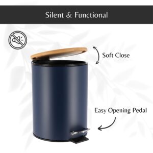 Open blue trash can showing the soft-close bamboo lid and the easy-to-use black foot pedal for convenient trash disposal.