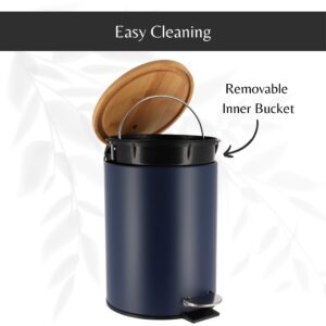 Blue step trash can with its bamboo lid open, revealing a removable inner bucket with a handle for hassle-free cleaning and maintenance.