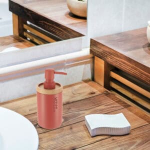Terracotta dispenser blending into a rustic wooden bathroom decor