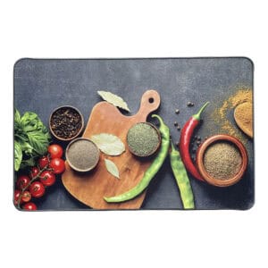 A single Fresh Ingredients kitchen mat on a plain white background, printed with basil, cherry tomatoes, chili peppers, and spice bowls on a slate surface.