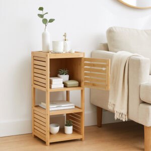 "Open louvered bamboo cabinet door revealing interior with books and plants, styled as a living room side table"