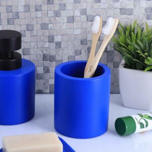 Blue bathroom set featuring a toothbrush holder