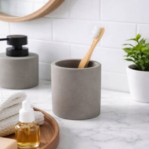 Gray bathroom tumbler with bamboo toothbrush modern countertop decor