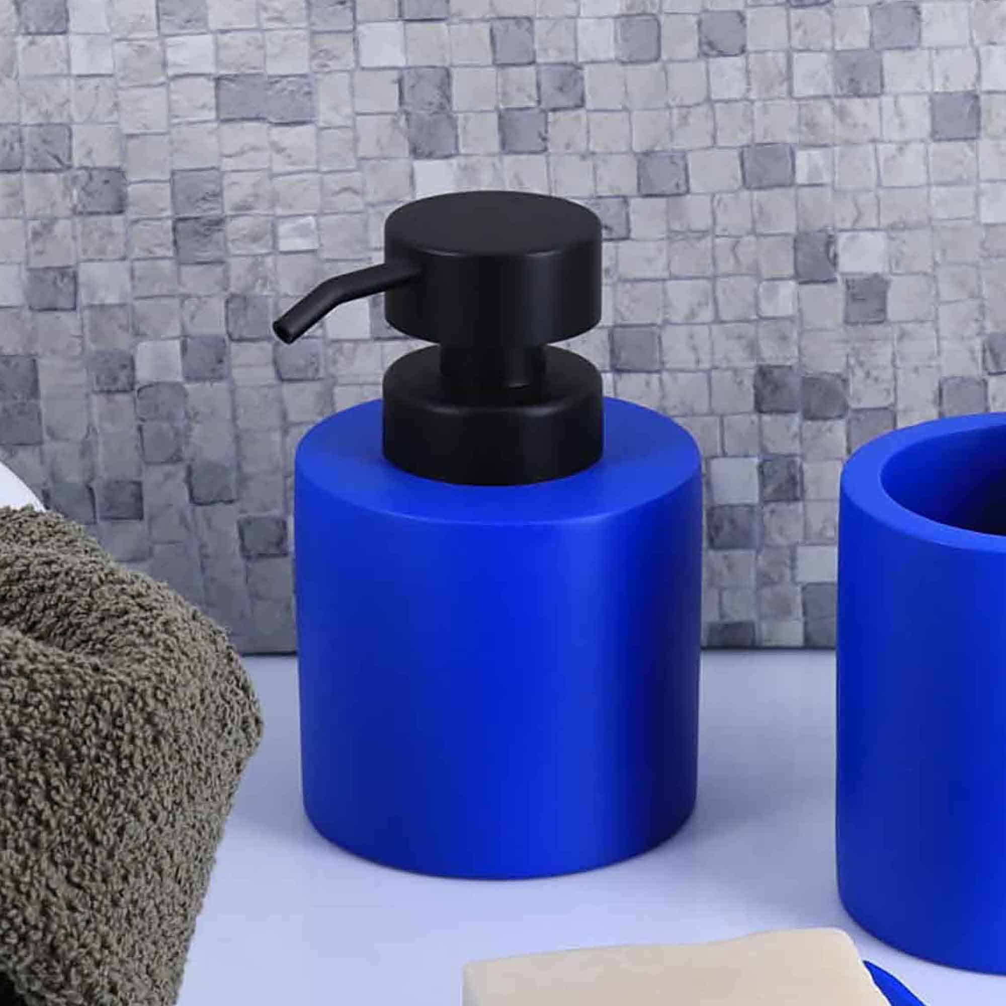 Blue bathroom set featuring a soap dispenser