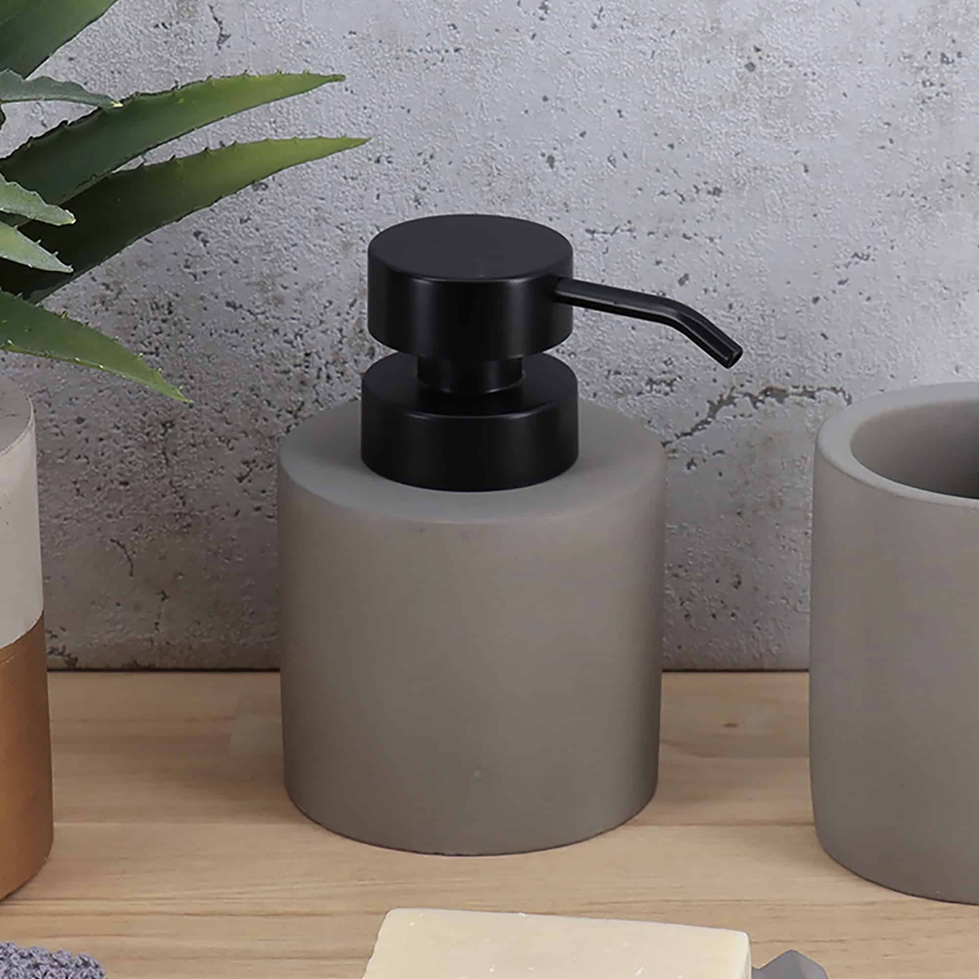 Gray bathroom set featuring a soap dispenser