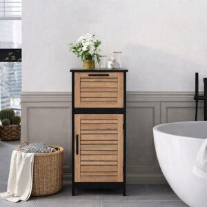 "Black and oak louvered bathroom cabinet styled with flowers and candles beside a freestanding bathtub"