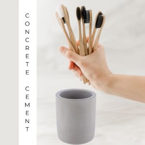 Durable gray concrete toothbrush holder with bamboo brushes