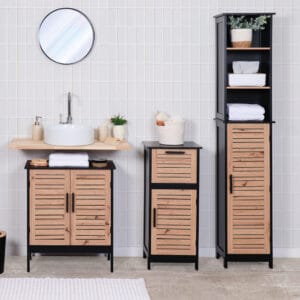 The cabinet integrated into a modern bathroom, alongside a vanity and storage unit.