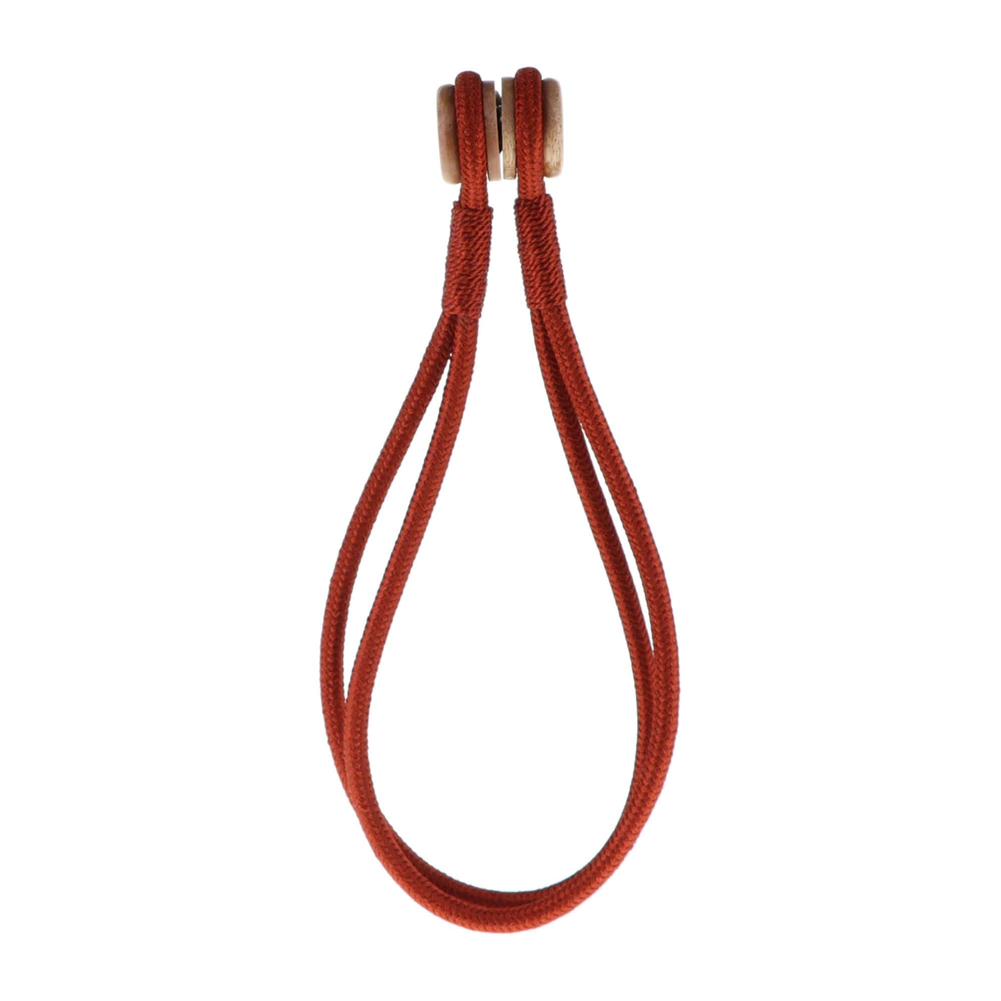 Magnetic Curtain Tieback with Wooden Tips – A rust-colored braided curtain tieback with wooden magnetic tips.