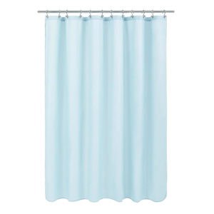 Light blue shower curtain hanging on a rod