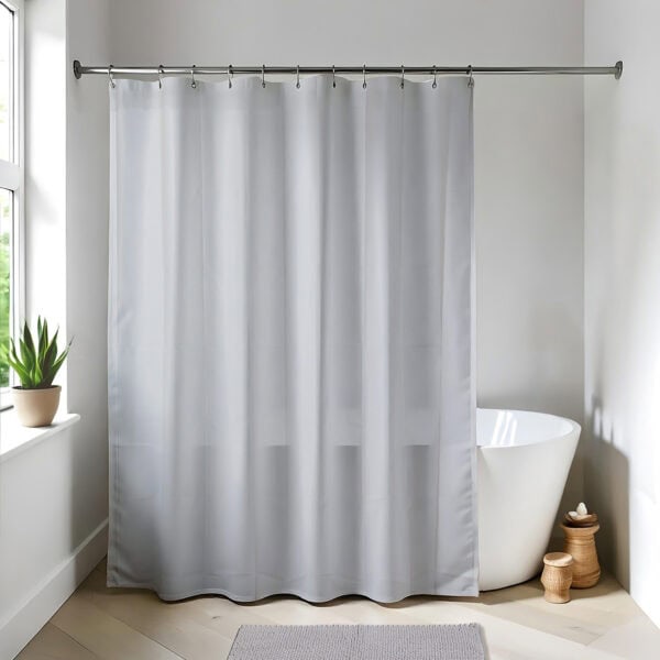 Light gray shower curtain in a bright modern bathroom