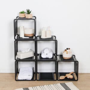 Stackable Bamboo Cubes for Storage – Multiple black bamboo storage cubes stacked in different configurations, showcasing their versatility for bathroom, living room, or office organization.