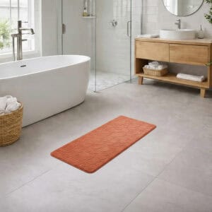 Copper memory foam runner mat placed beside bathtub