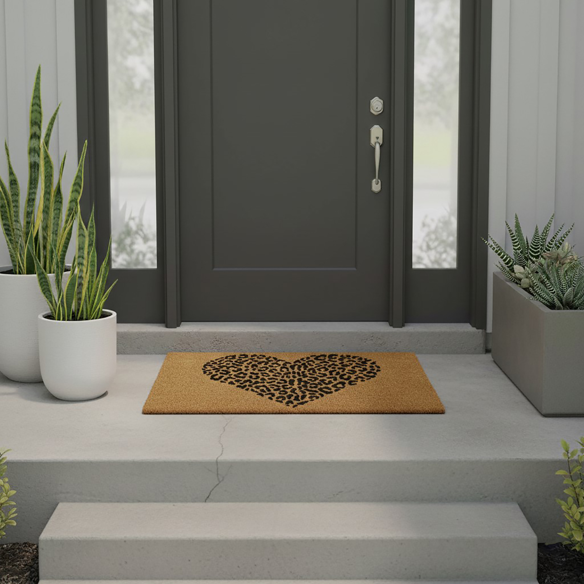 Leopard heart natural coir doormat on modern porch with white planters