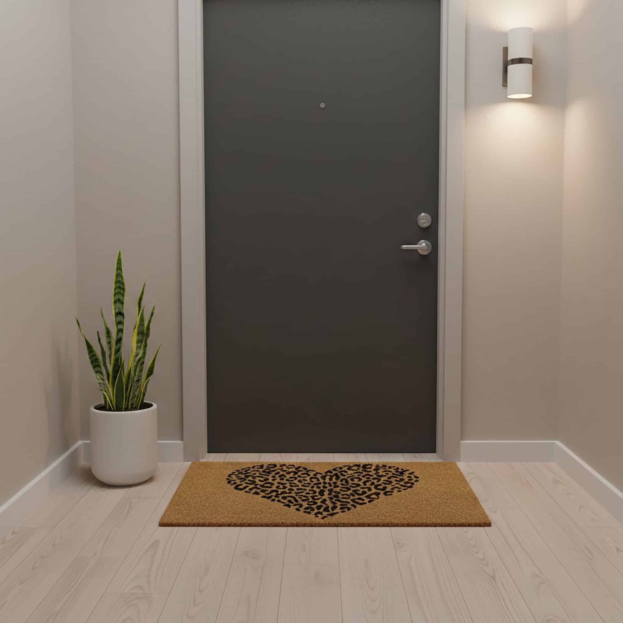 Leopard heart design coir doormat inside hallway at grey entry door
