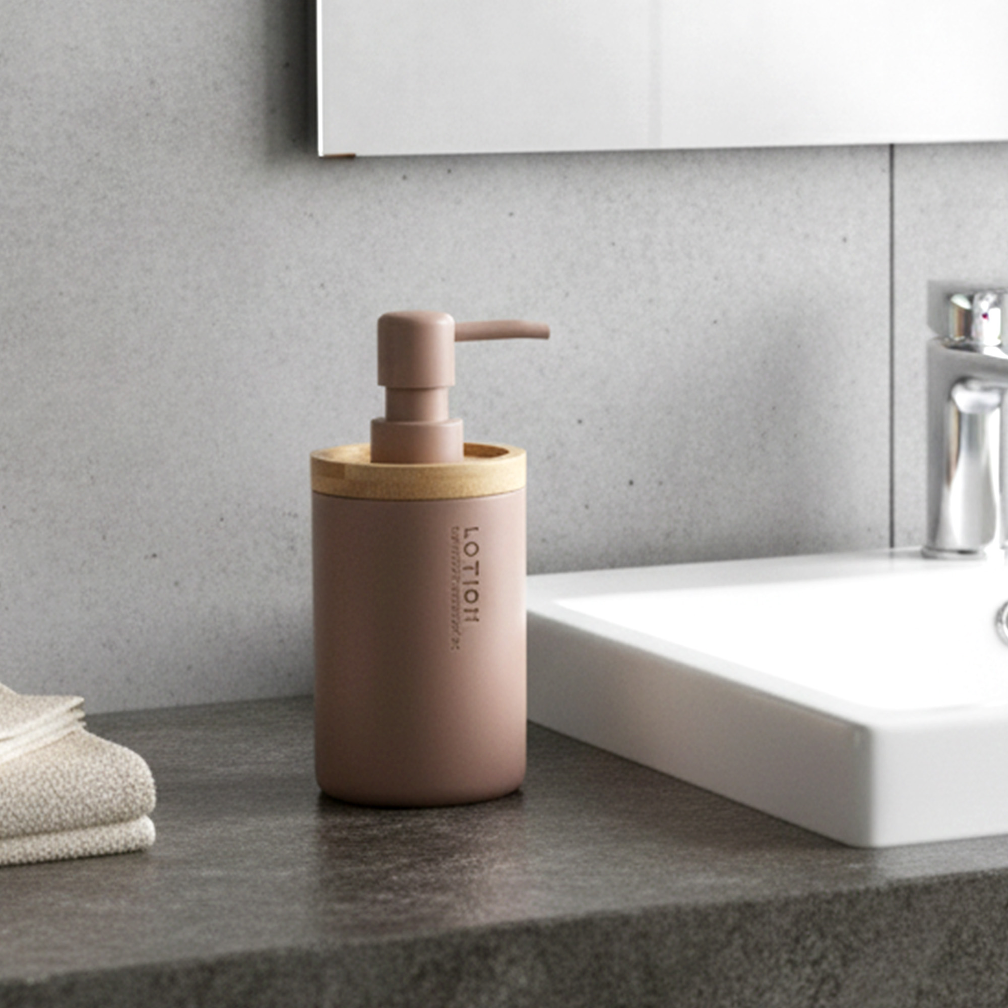 Cappuccino bathroom lotion dispenser with bamboo top on vanity