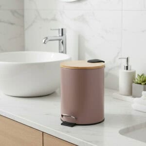 Cappuccino step trash can with bamboo lid on bathroom countertop
