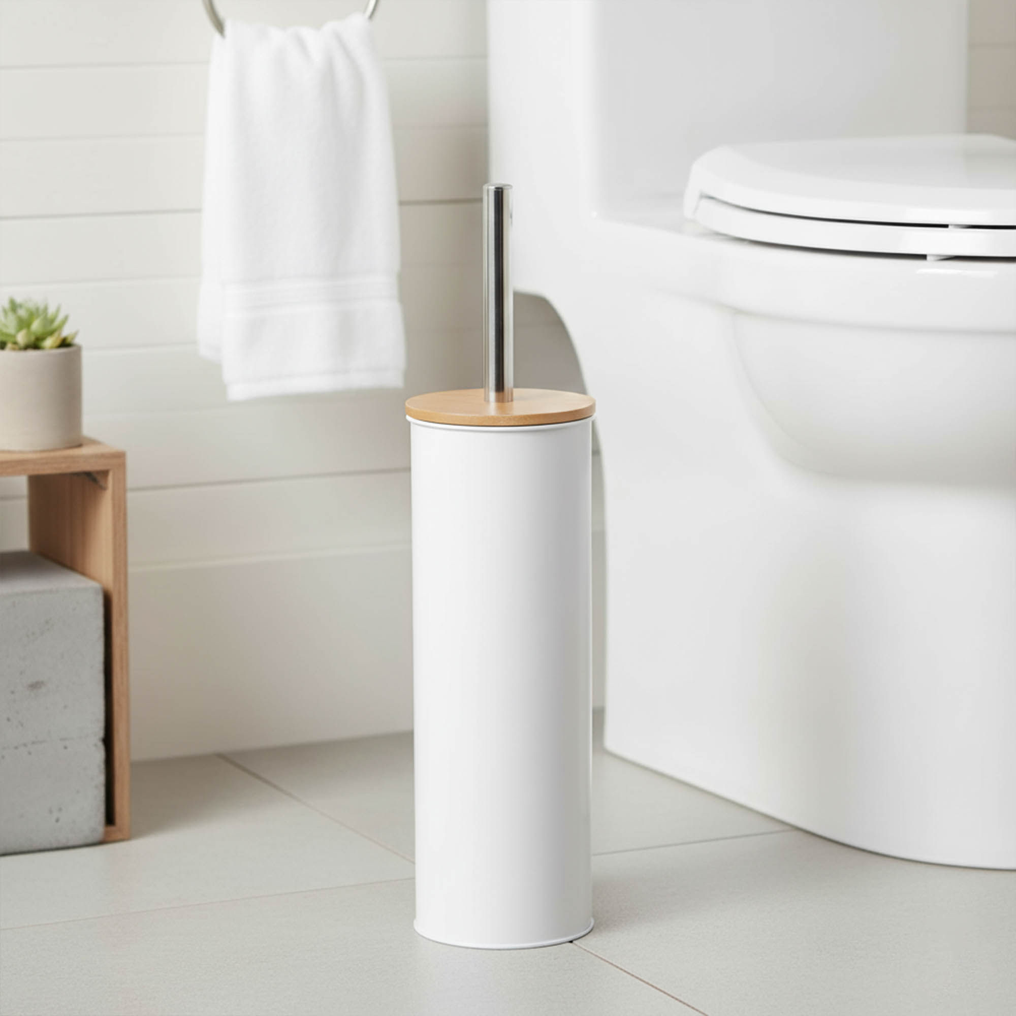 "Modern white toilet brush with bamboo top and stainless steel handle in bathroom"