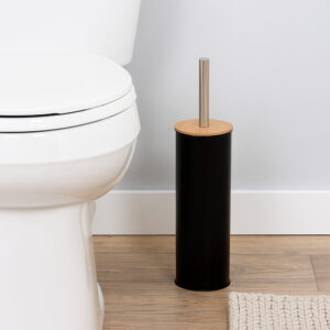 "Black toilet brush holder with bamboo lid and steel handle beside white toilet"