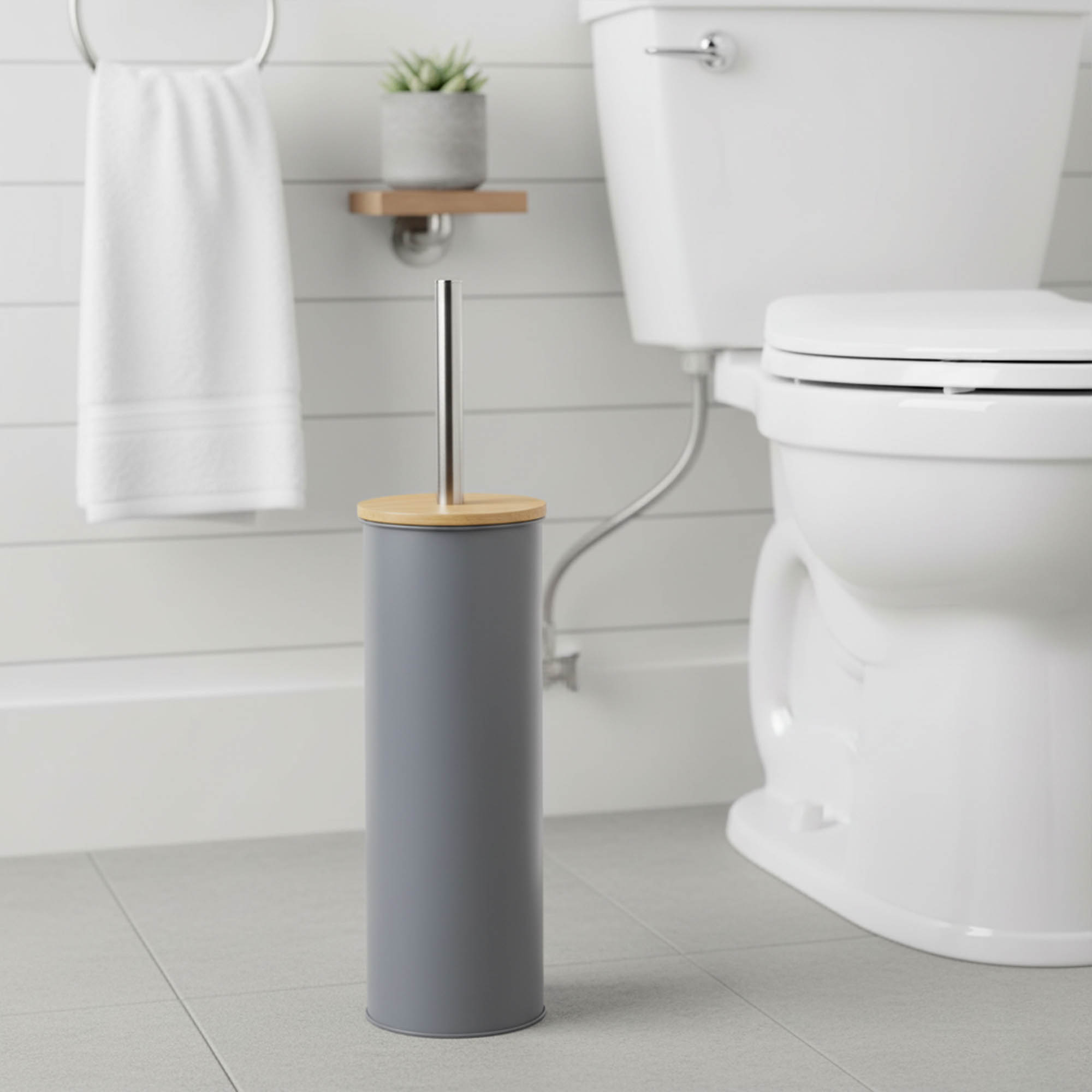 "Modern gray toilet brush with bamboo top and stainless steel handle in bathroom"