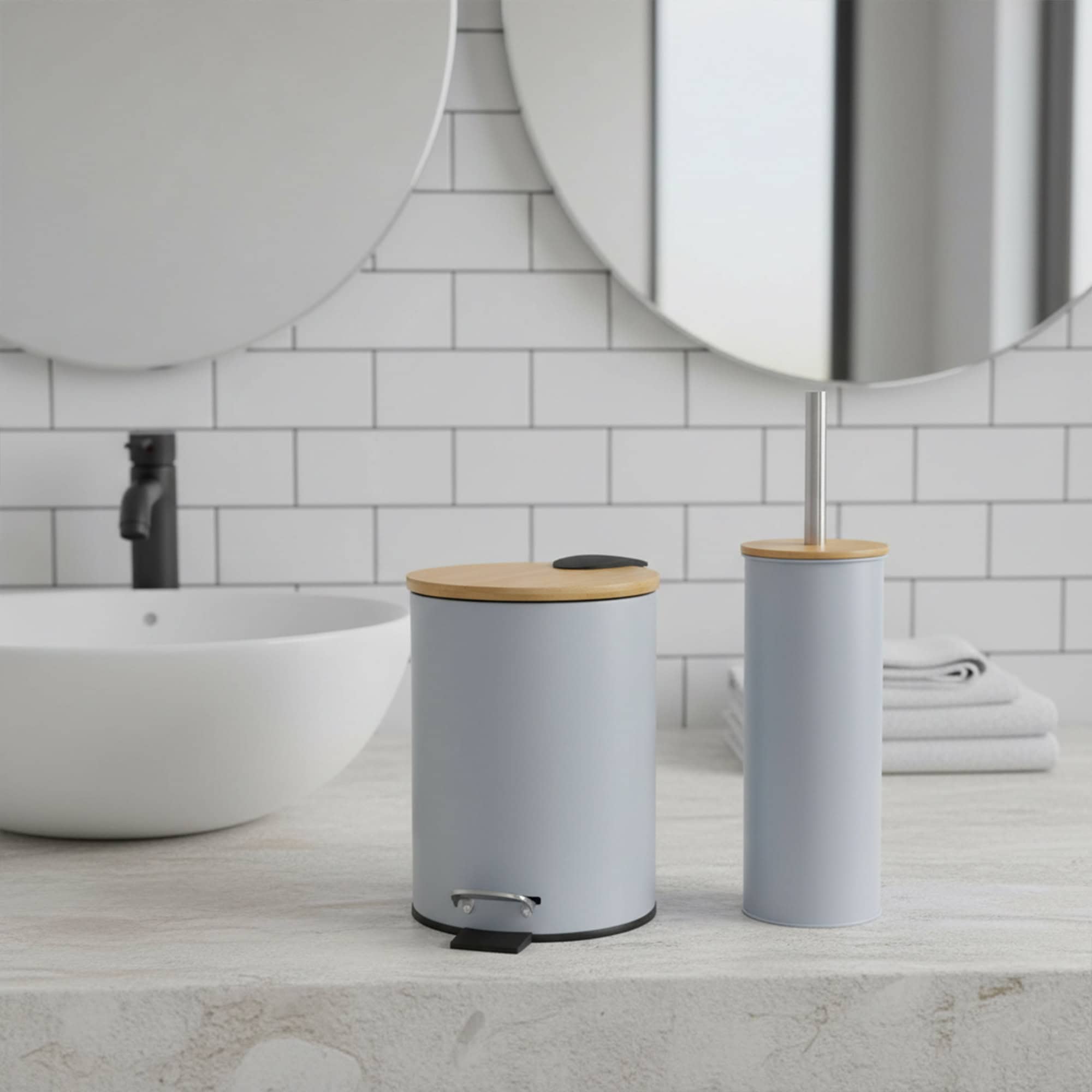 “Light blue trash can and toilet brush with bamboo lids on bathroom counter”