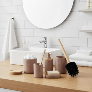 Cappuccino bathroom accessory set with bamboo lids and accents displayed on countertop